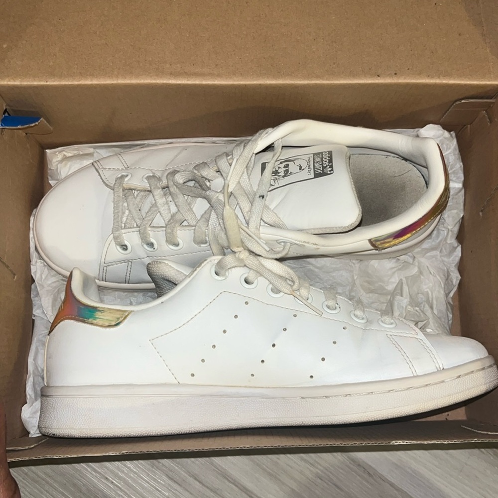 These are Adidas shoes, white and multi color, original Stan Smith Adidas